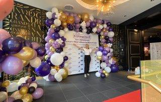 Balloon photo backdrop step and repeat at a Boston corporate event