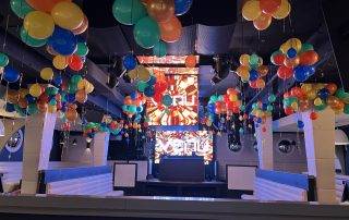 Corporate event balloon decor installation in a Boston office lobby